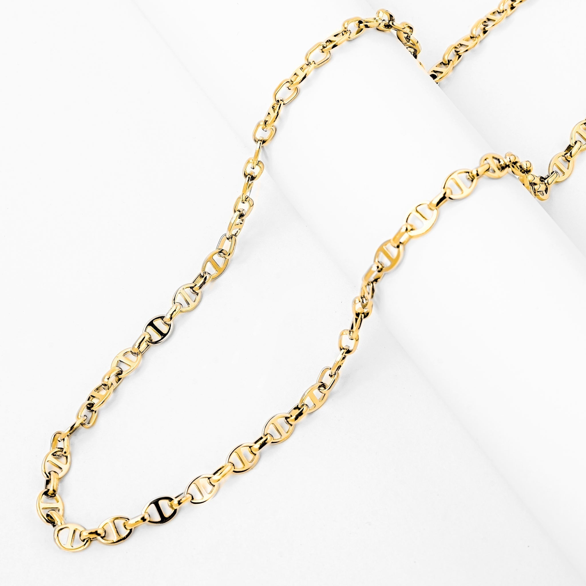 Two Big Daddy 8mm gold mariner link chains shown side by side