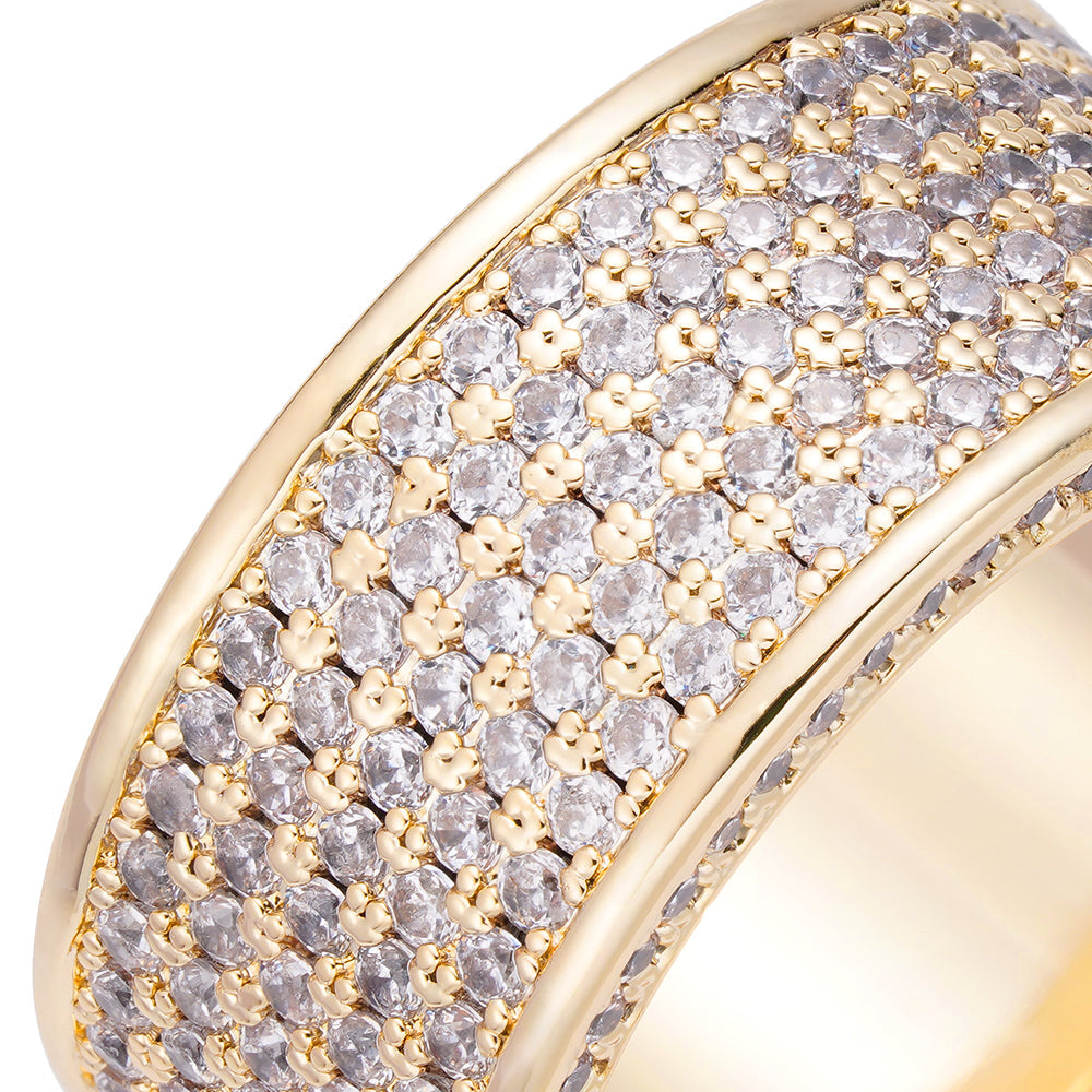 Detailed close-up of pave diamond and cubic zirconia stone setting on ring band