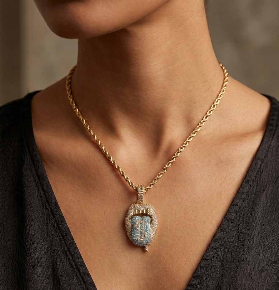 Gold rope chain necklace with iced out dollar tongue pendant worn on neck