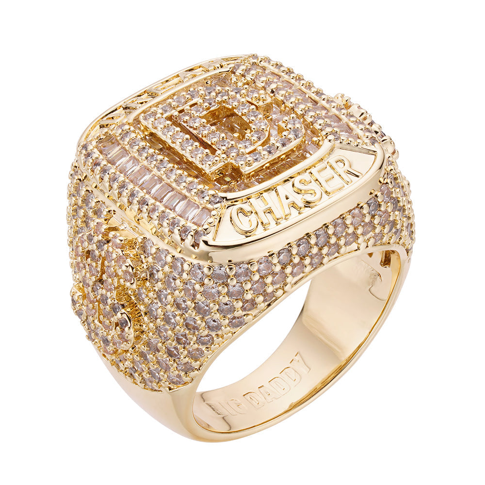 Gold baguette iced out diamond ring with pavé diamonds and Dream Chaser nameplate