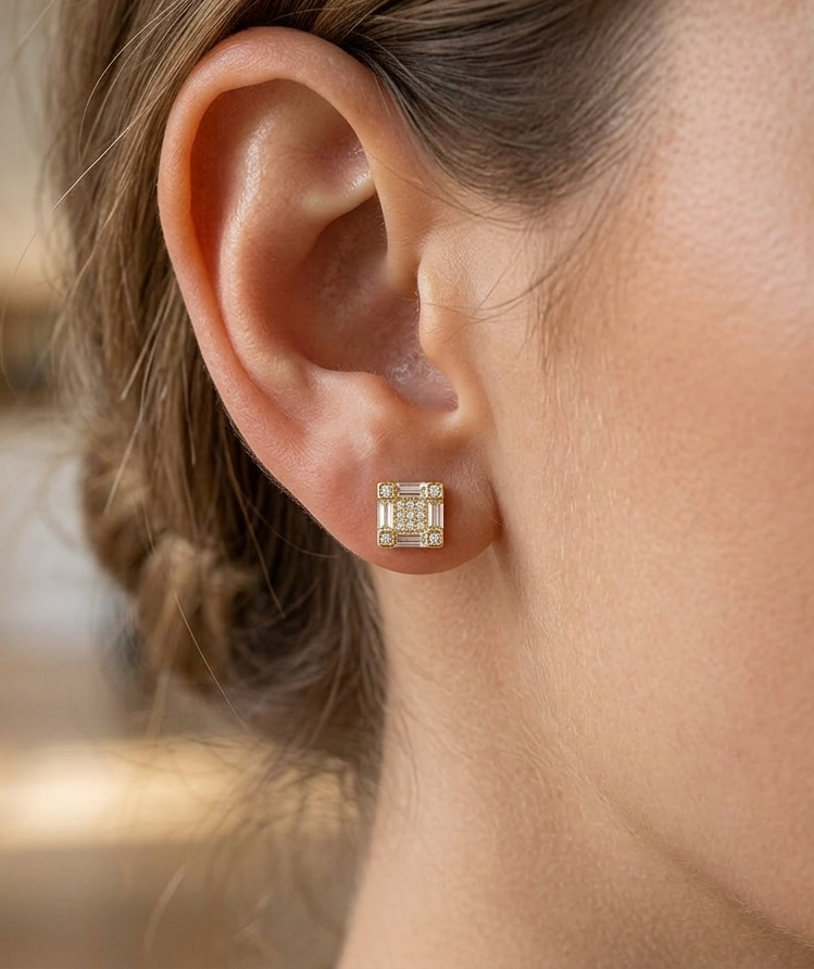 Big Daddy emerald cut baguette diamond earring worn on ear