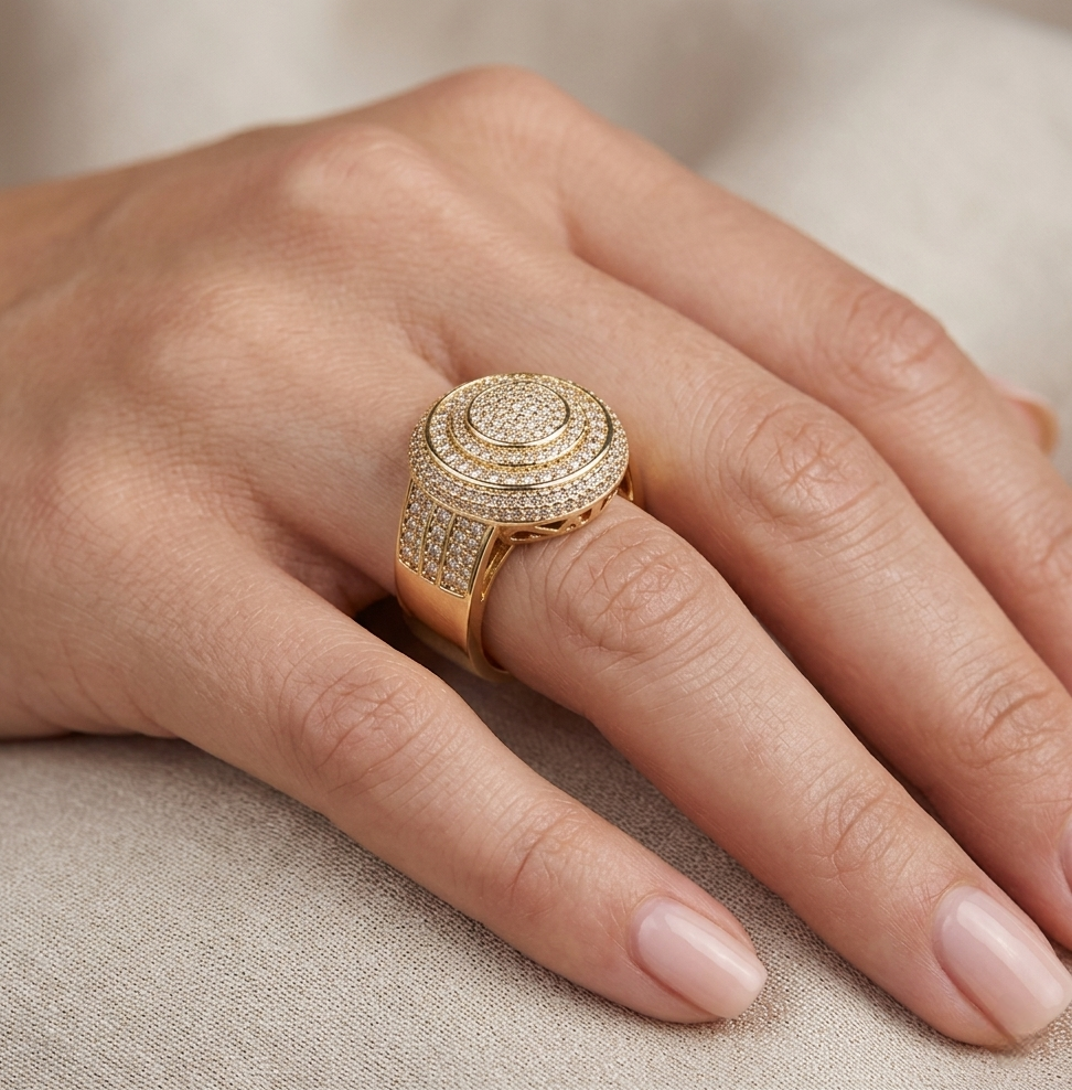 Gold iced out diamond ring worn on hand showing size and sparkle on finger