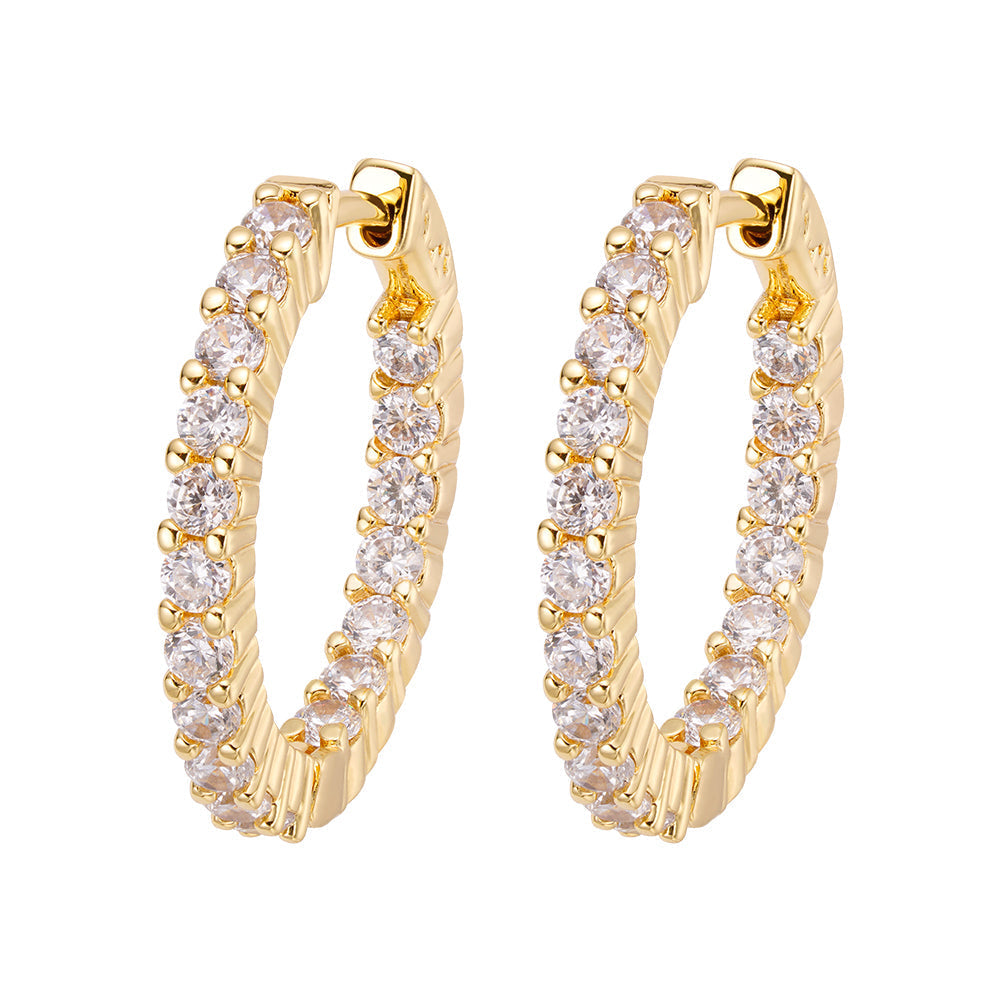 Gold hoop earrings with round diamond accents, displayed as a pair