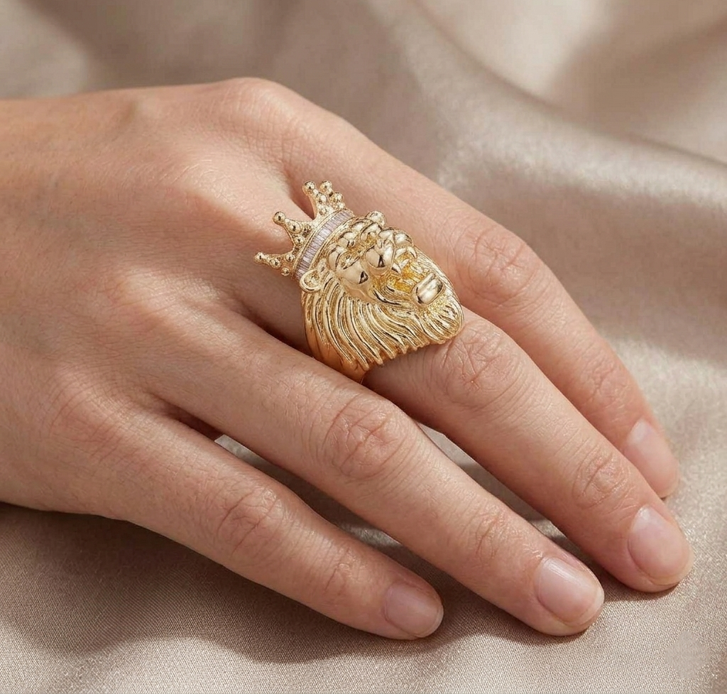 Big Daddy lion diamond ring worn on hand against fabric background