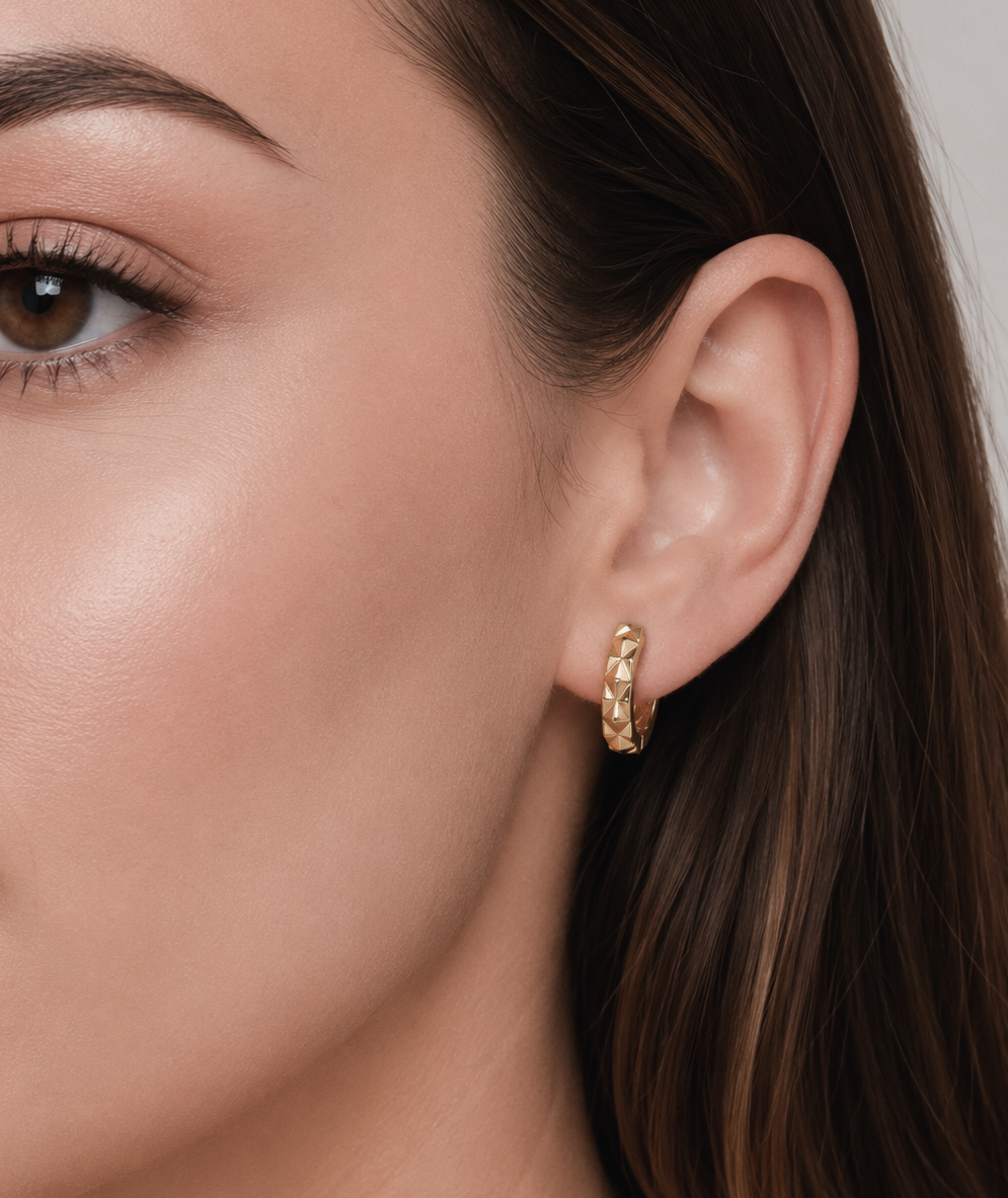 Big Daddy Loop Gold Earring worn on ear, showing size and fit on female model