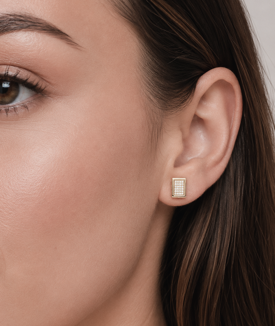 Gold square pave diamond earring worn on ear, side profile