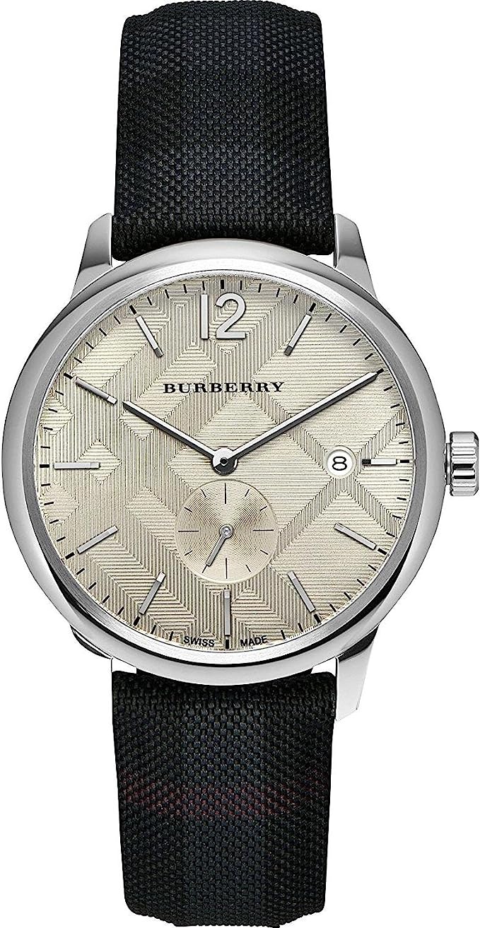 Burberry men's watch with cream dial, black check stamped leather strap, and date window