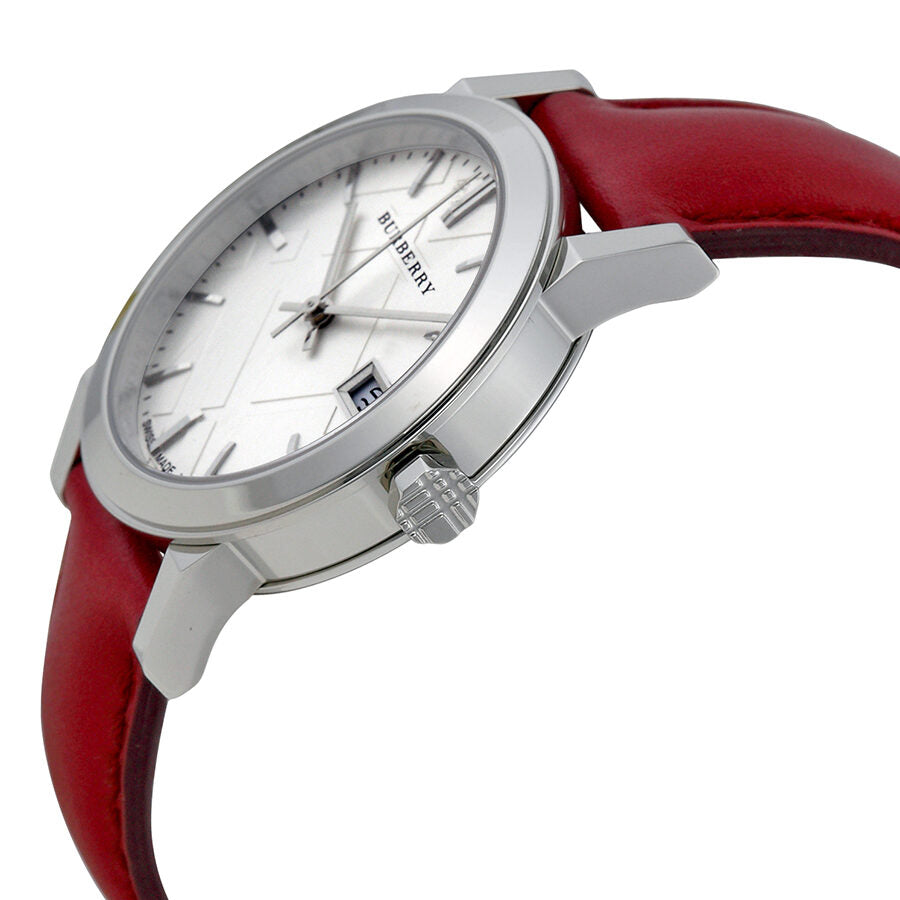 Side angle view of Burberry BU9129 watch with stainless steel case and red leather band