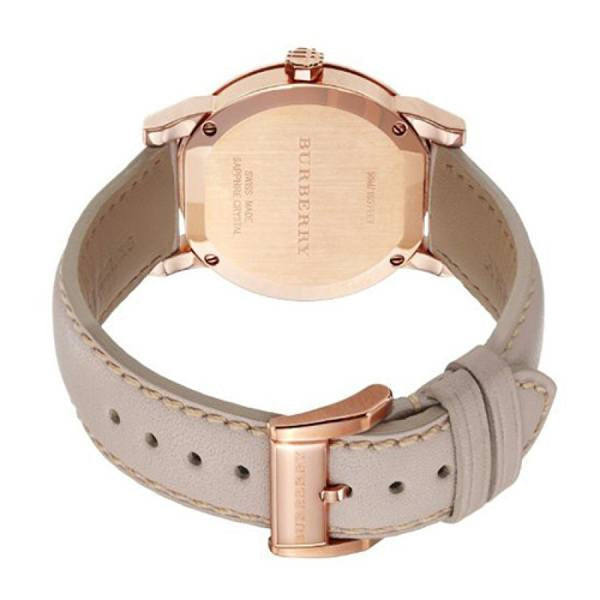 Burberry The City caseback showing stainless steel with Burberry branding and pink leather strap