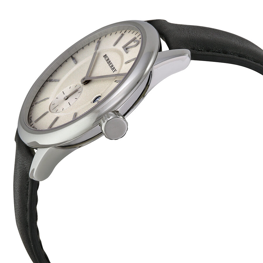 Side angle view of Burberry Classic Round watch showing beige dial and stainless steel case