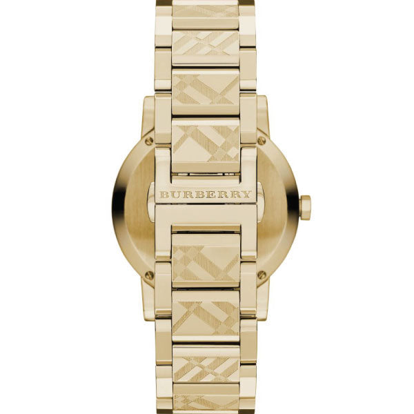 Burberry The City caseback showing gold tone stainless steel case and bracelet