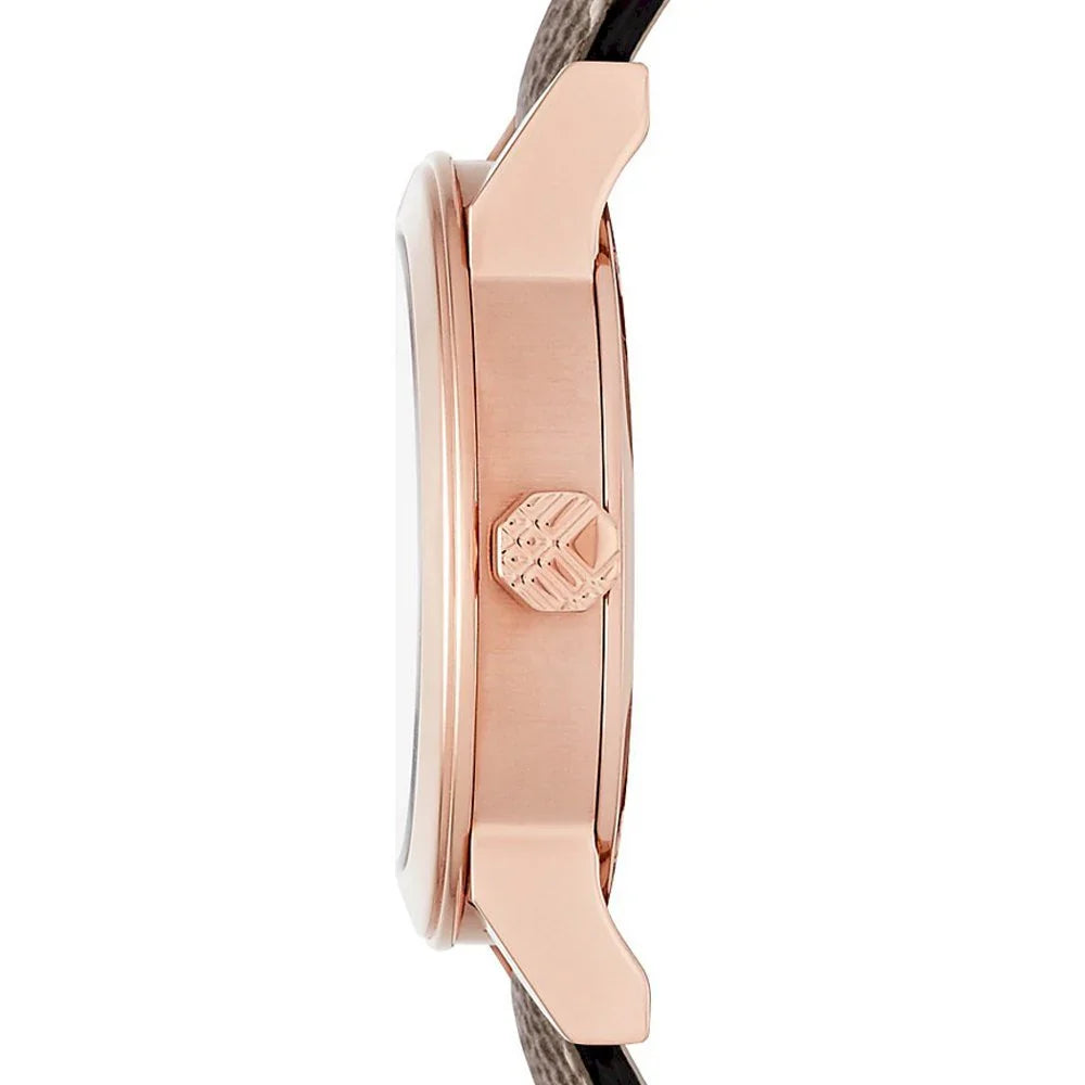 Side profile of Burberry The City watch showing rose gold case and striped leather strap