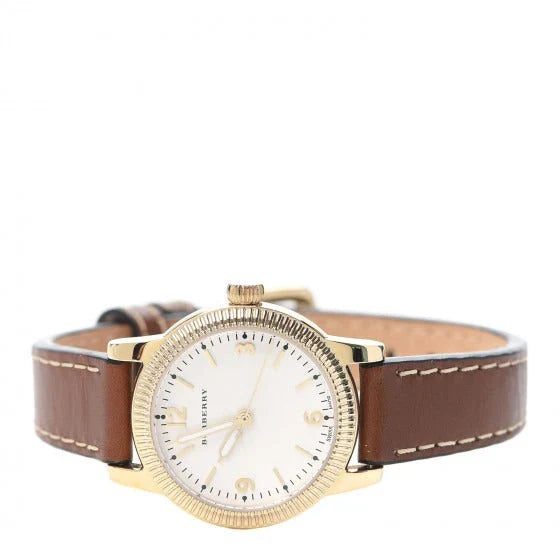 Burberry The Utilitarian BU7865 watch worn on wrist, showing white dial and brown leather strap