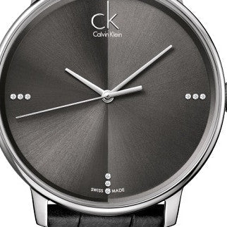 Close-up of Calvin Klein Accent dial with diamond indices and minimalist hour markers