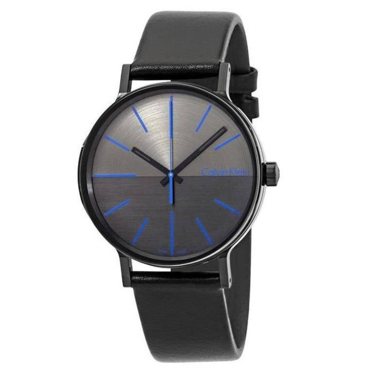 Calvin Klein Boost watch at angle showing black dial with blue index markers and hands