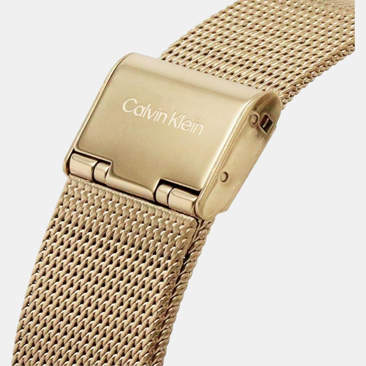 Calvin Klein gold mesh watch strap with magnetic clasp closure