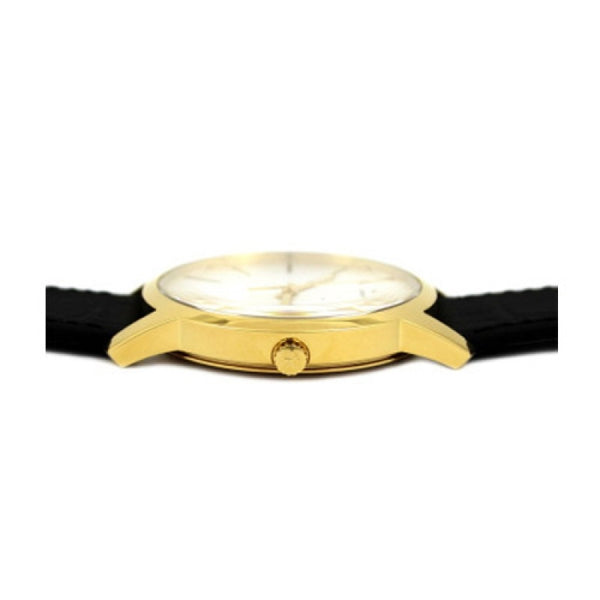 Side profile of Calvin Klein City gold watch showing case and black leather strap