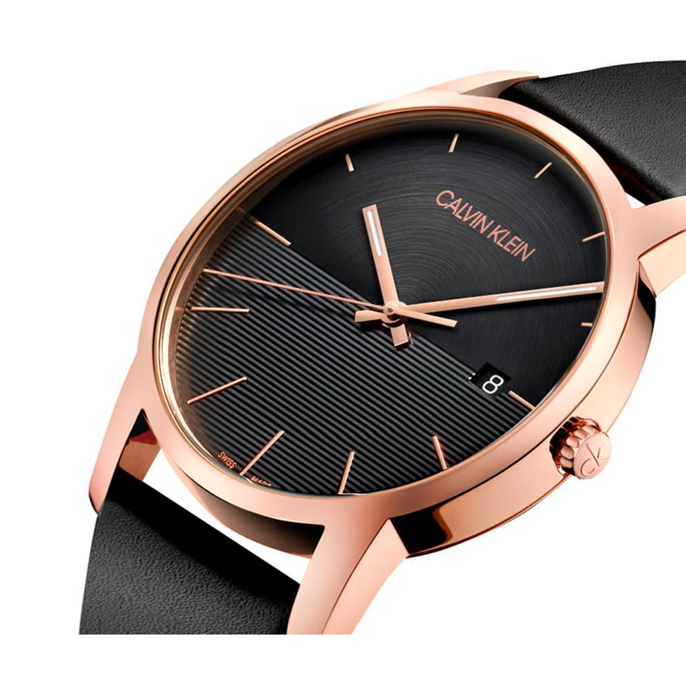 Calvin Klein City men's watch at angle showing black dial, rose gold case, and strap