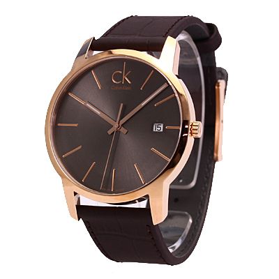 Side angle view of Calvin Klein City watch with gold case and dark brown leather band
