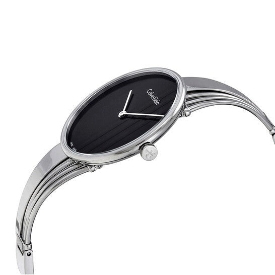 Calvin Klein Drift watch at angle showing silver bangle bracelet with multi-row design