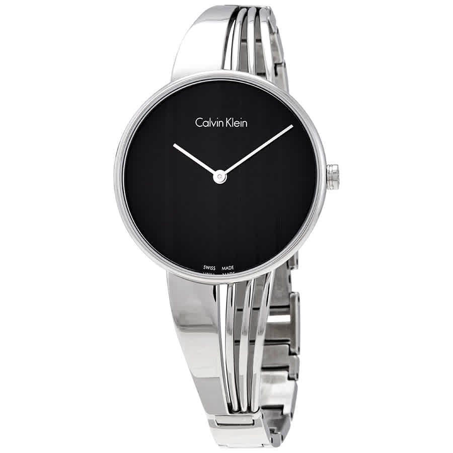 Calvin Klein Drift women's watch featuring black minimalist dial and polished silver bangle