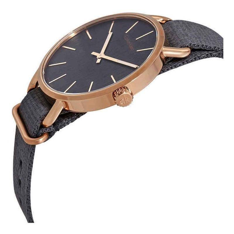 Calvin Klein Even men's watch worn on wrist showing grey dial and fabric strap