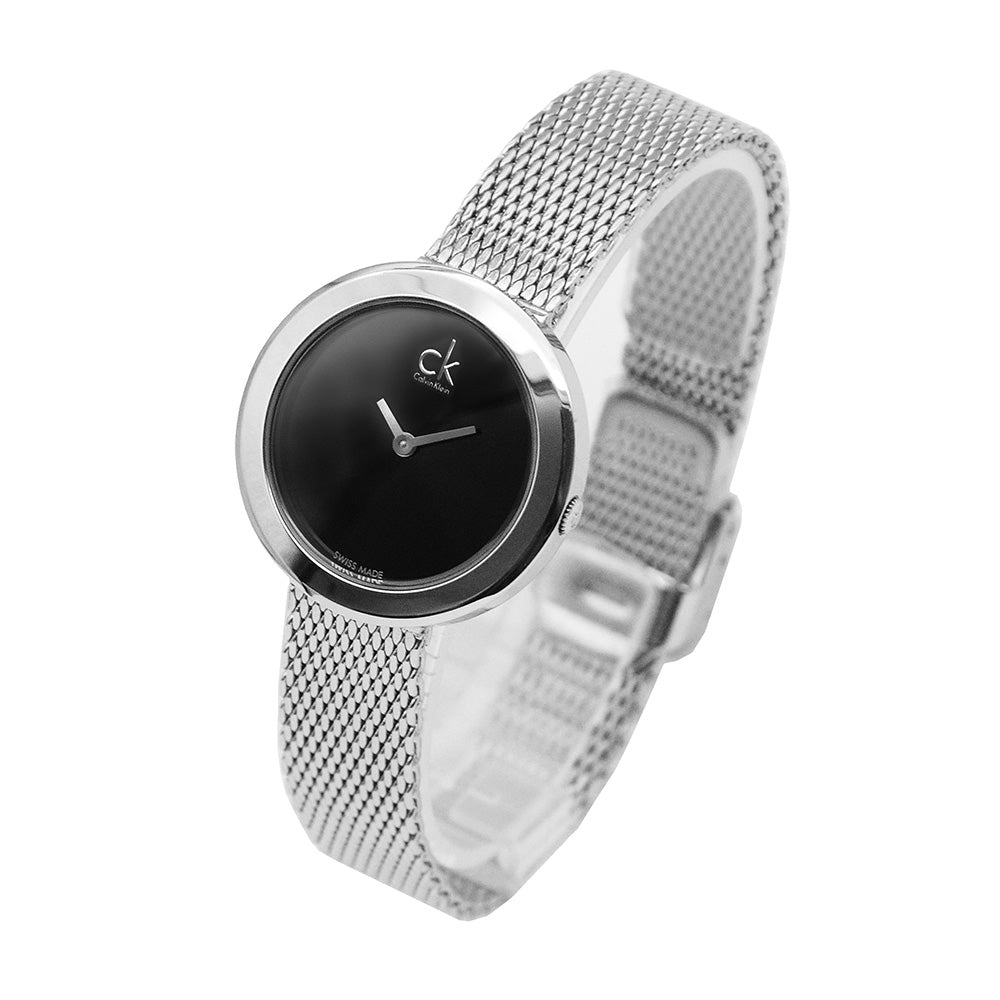 Calvin Klein Firm watch worn on wrist showing silver mesh bracelet and black dial