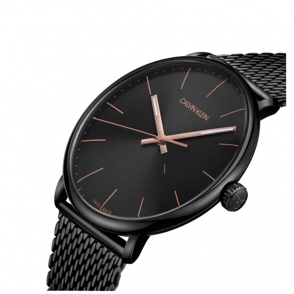 Calvin Klein High Noon watch displayed on wrist with black mesh bracelet