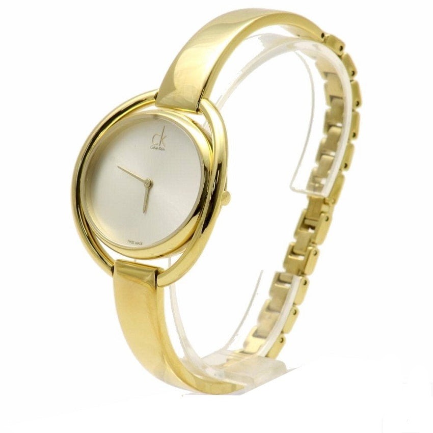 Side profile of Calvin Klein Impetuous gold watch showing case depth