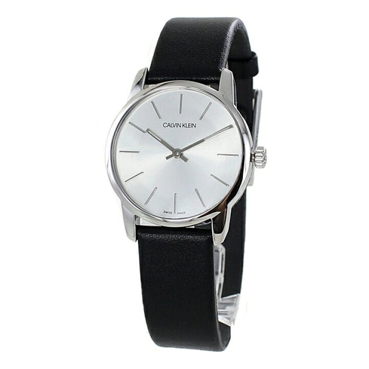 Calvin Klein white dial watch worn on wrist with black leather band