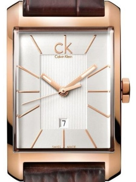 Dial detail of Calvin Klein K2M23620 showing white dial with rose gold hour markers, date window at 6 o'clock