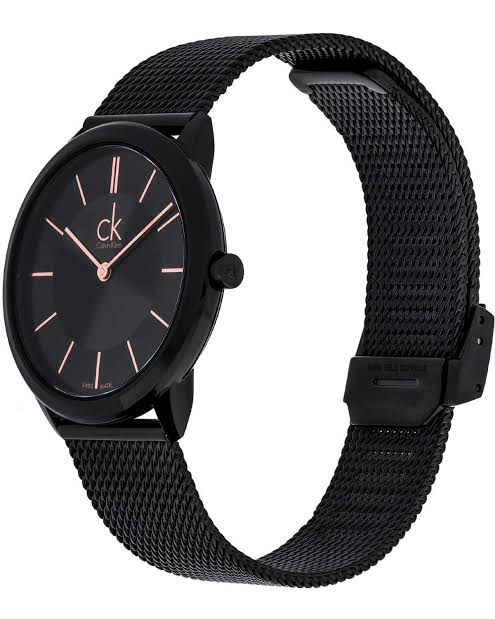 Calvin Klein K3M22421 women's watch on wrist showing black dial with rose gold accents and mesh strap