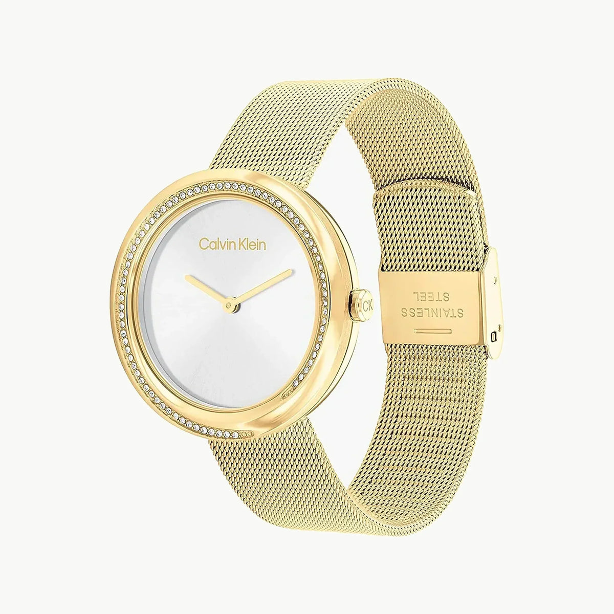 Calvin Klein white dial watch with gold mesh strap on wrist angle view
