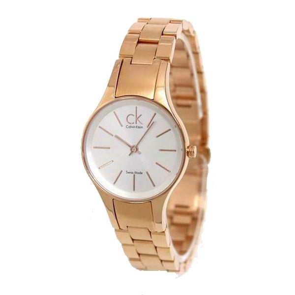 Angled view of Calvin Klein K4323520 showing rose gold-tone case, white dial, and metal bracelet