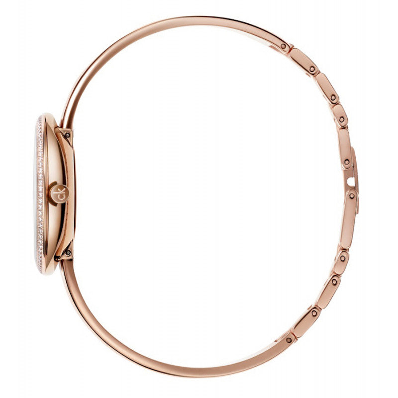Calvin Klein Seduce watch strap view showing segmented rose gold-tone bracelet with white leather accent