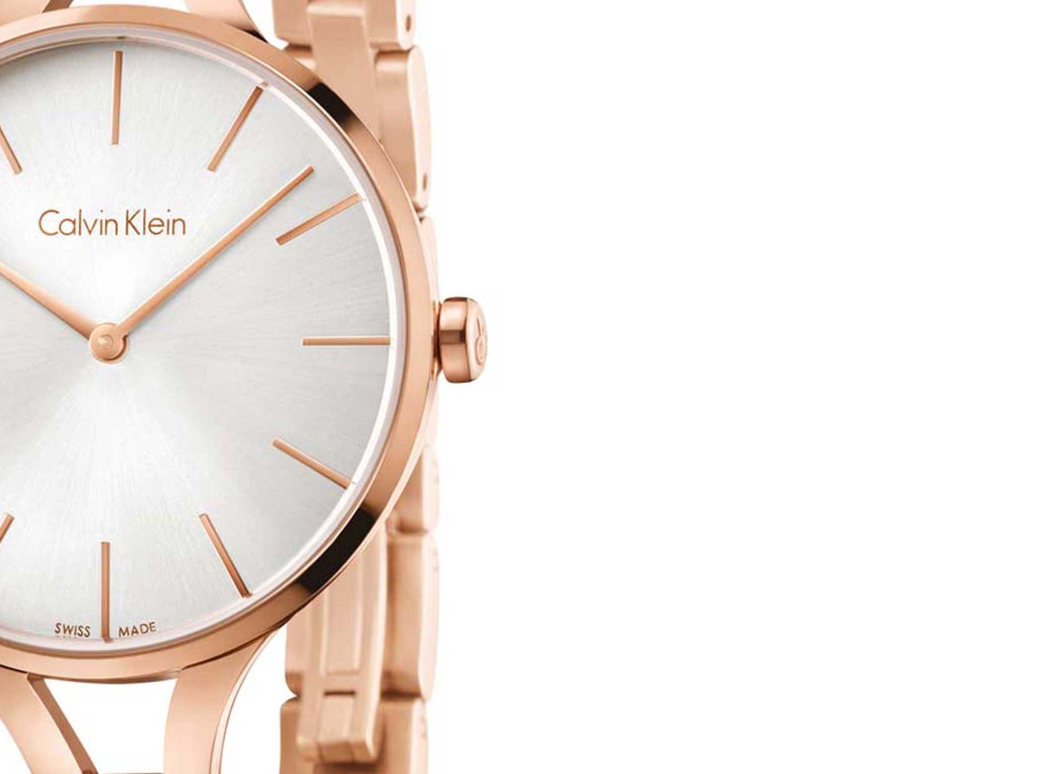 Close-up of Calvin Klein K7E23646 dial showing silver face and rose gold indices