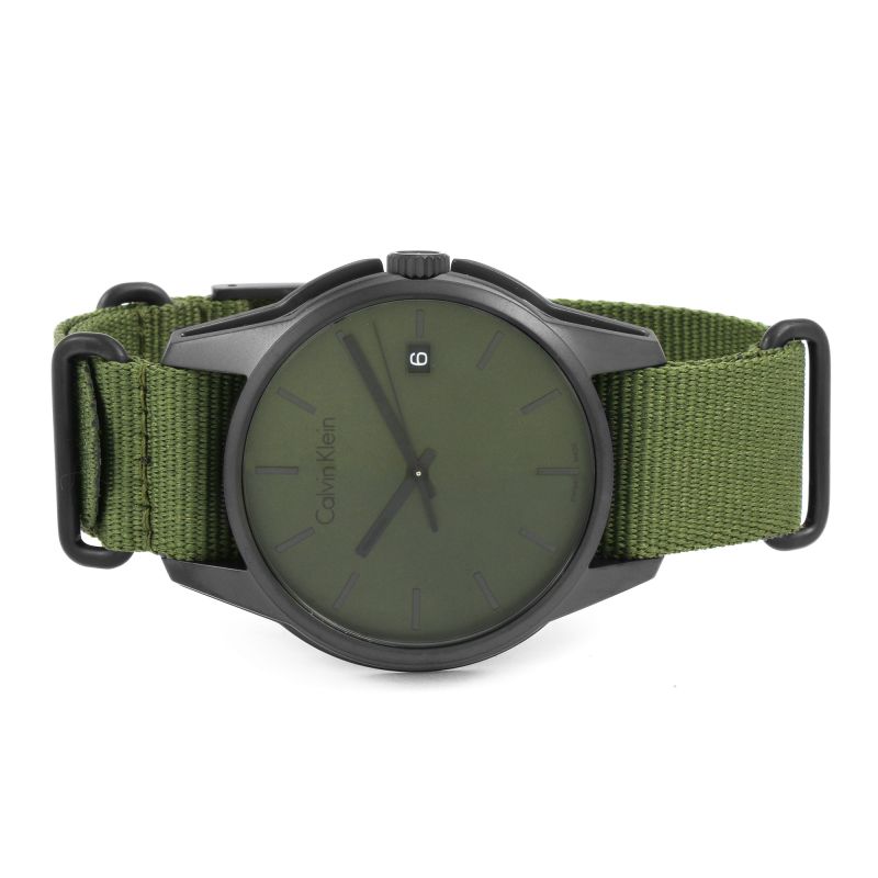 Calvin Klein K7K514WL watch worn on wrist showing green NATO strap fit
