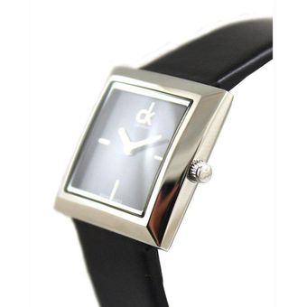 Calvin Klein Mark watch side view with silver case and black leather strap