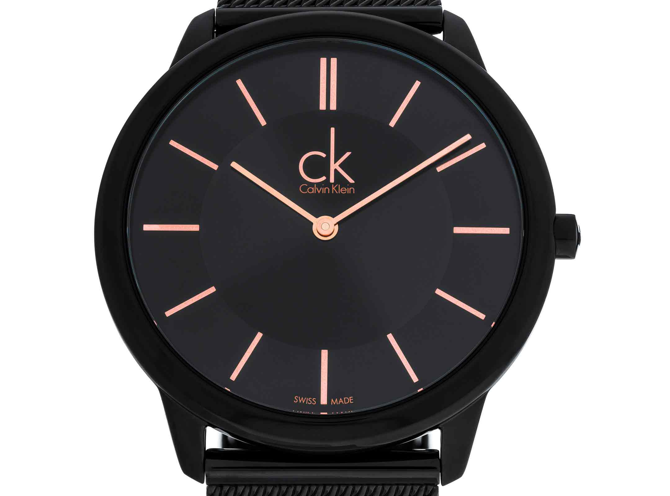 Close-up of black dial with rose gold hour markers and ck logo