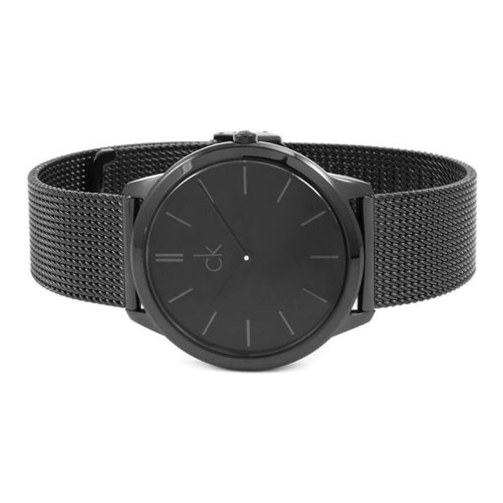 Calvin Klein Minimal watch worn on wrist showing black mesh strap and dial