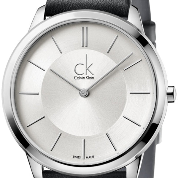 Close-up detail of Calvin Klein Minimal dial showing bar indices and Swiss-made marking