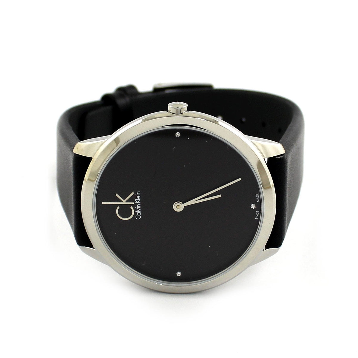 Calvin Klein Minimal K3M221CS women's watch worn on wrist with black leather strap and dial