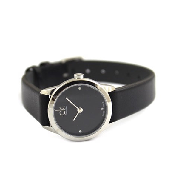 Calvin Klein Minimal watch on wrist with black leather strap and dial