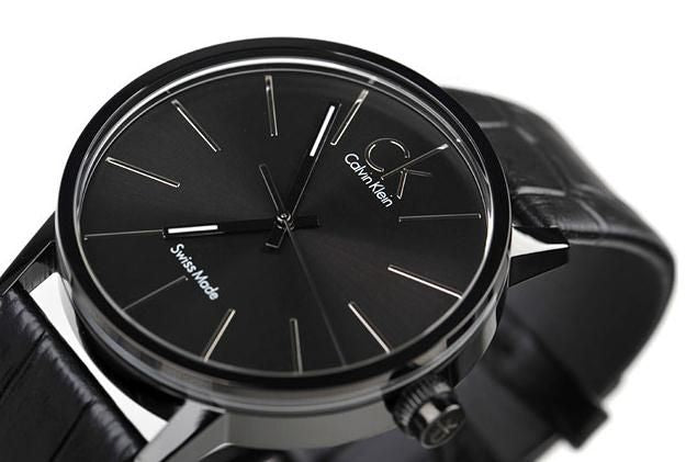 Calvin Klein Post Minimal watch worn on wrist with black leather strap