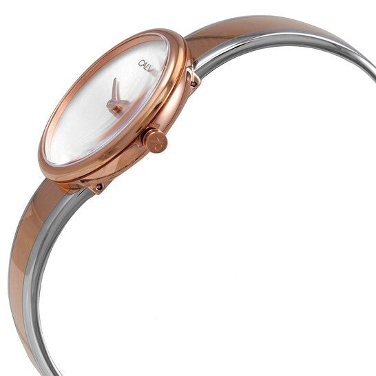 Calvin Klein Seduce K4E2N61X watch angled view with silver dial and rose gold case