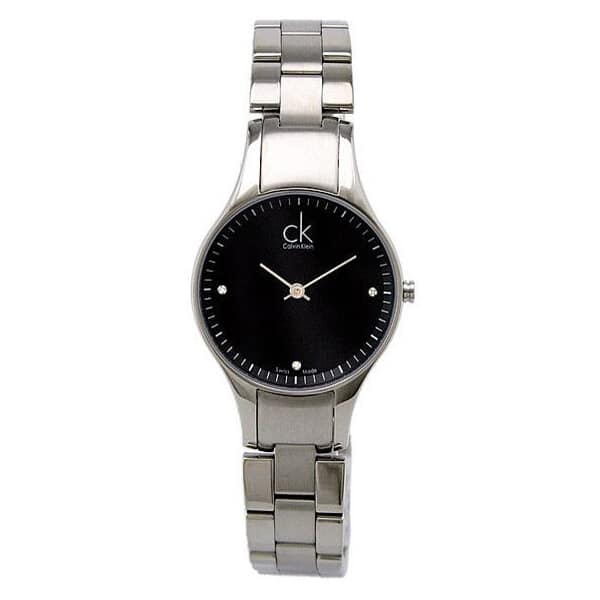 Calvin Klein Simplicity watch with minimalist black dial, white hands, and diamond indices on steel bracelet
