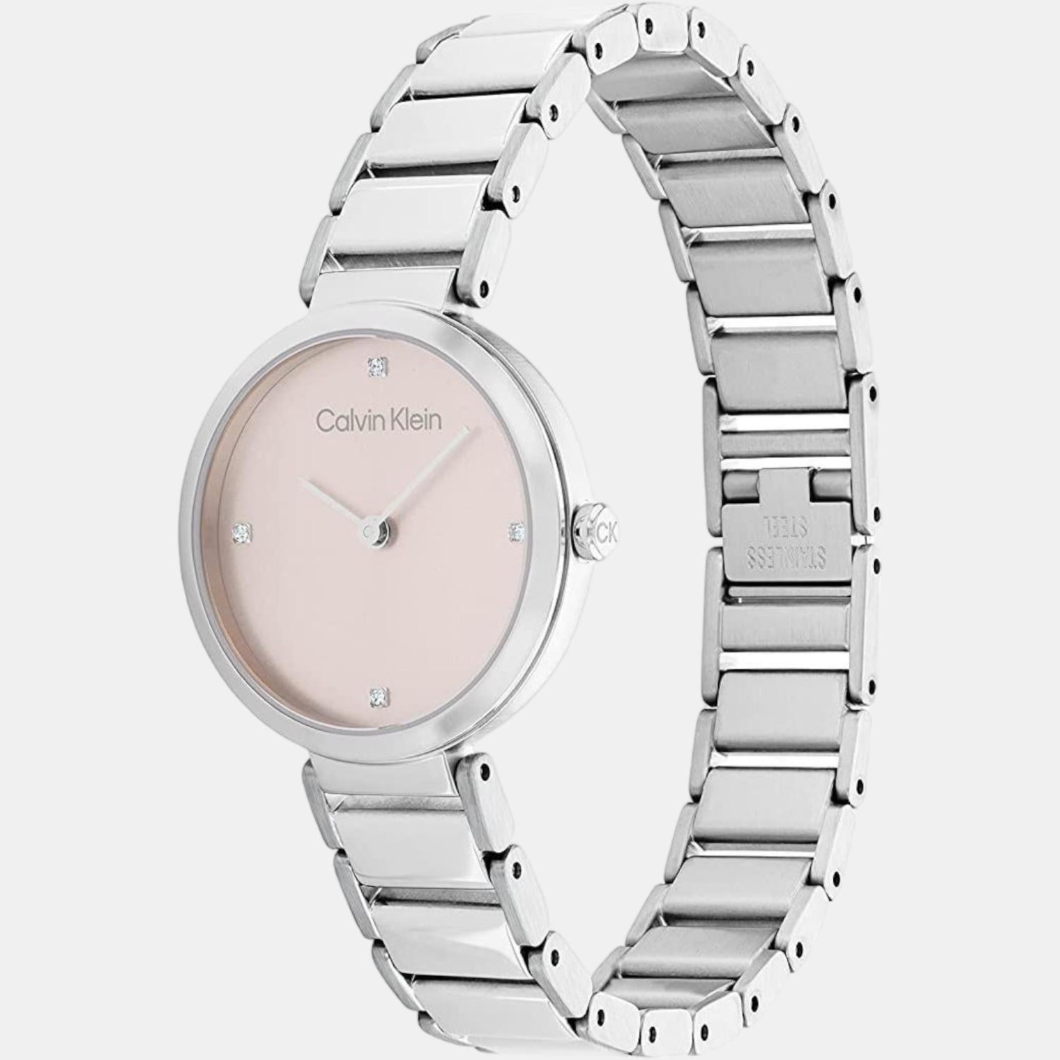 Calvin Klein Stately watch angled view showing nude dial and silver link bracelet