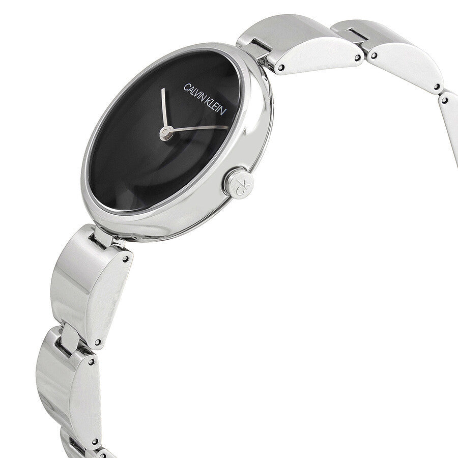 Calvin Klein Wavy K9U23141 ladies quartz watch on wrist showing black dial and metal bracelet