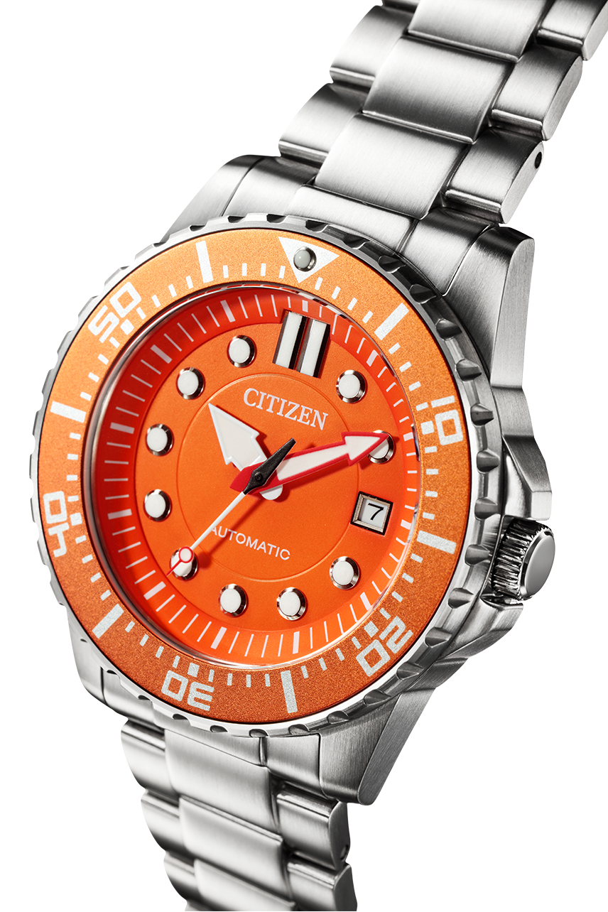 Angled view of Citizen Super Titanium watch showing orange dial and linked titanium bracelet