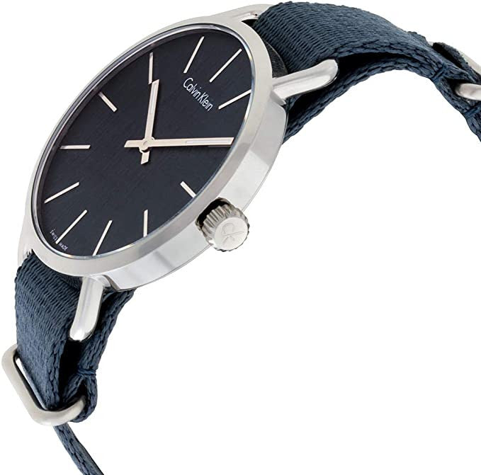 Calvin Klein K7B211WL watch on wrist showing blue fabric strap and dial